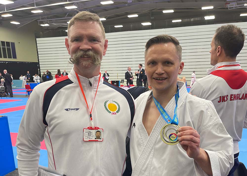 Tim, pictured with his coach and mentor, Matt Price Sensei