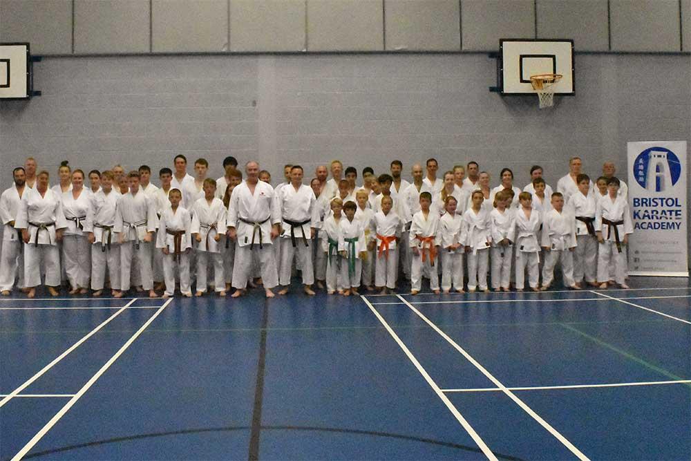 The group from class 1 with Karate legend Sensei Frank Brennan. Photo credit: Annette Connell.